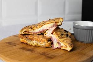 Grilled ham and cheese sandwiches. Perfect breakfast. photo