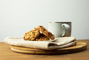 Shortbread cookies with nuts and tea. Delicious dessert. photo