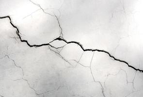 white wall with cracks photo