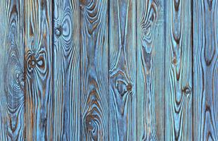 Blue wooden planks background, old and grunge blue colored wood texture photo