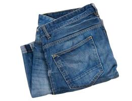 Denim Shorts Isolated on White, folded jeans shorts over white background, blue jean shorts, clothes fashion element, summer cloth photo