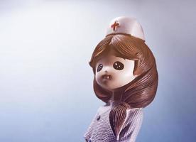 close up of cartoon character doctor uniform photo