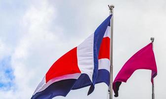 Flag of Costa Rica cloudy blue sky Costa Rican flag. photo