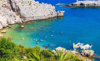 St Pauls Bay panorama with clear water Lindos Rhodes Greece.