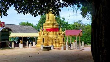 Golden stupa temple Wat Sila Ngu Koh Samui Thailand.