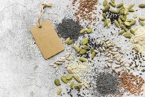 Mix different seeds for a healthy salad photo