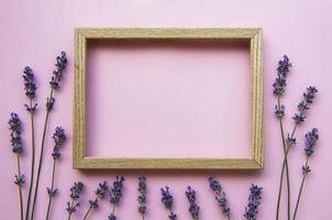 Wooden frame with beautiful flowers of fragrant lavender photo