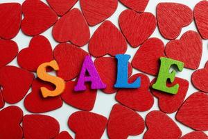 The word sale is posted on the hearts. photo