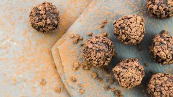 chocolate truffles with biscuit crumb stone countertop photo