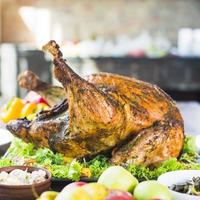 roasted turkey with food table