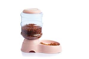 Pet Dry Food Storage Meal Feeder Dispenser or pet food dispenser on a white background photo