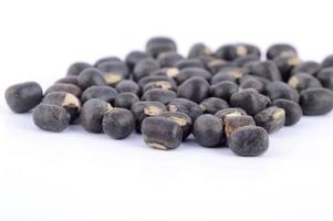 Urad dal, black gram, Vigna mungo on white background photo