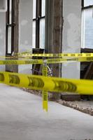 Caution tape on remodeling area of commercial building