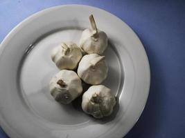 Fresh garlic on the table photo