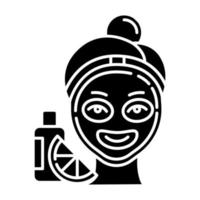 Vitamin C mask glyph icon. Skin care procedure. Facial treatment. Everyday beauty routine step. Face product for exfoliating effect. Silhouette symbol. Negative space. Vector isolated illustration