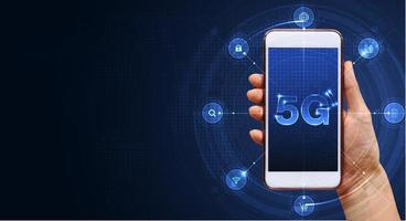 Hand of woman or man holding smartphone use 5G network wireless systems and internet of things with man touching with wireless high-speed Internet communication network background photo