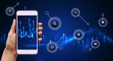 Hand of woman or man holding smartphone use 5G network wireless systems and internet of things with man touching with wireless high-speed Internet communication network background photo