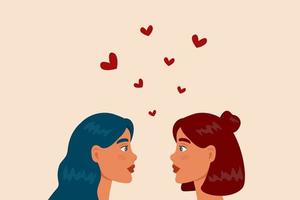 Lgbt lesbian girls couple. Portrait of adorable young women flirting with each other. Make love concept. Happy smiling people enjoy togetherness.