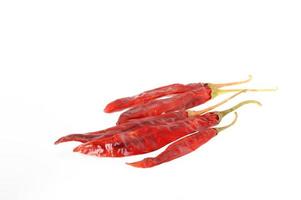 Red Chilli peppers isolated on white photo