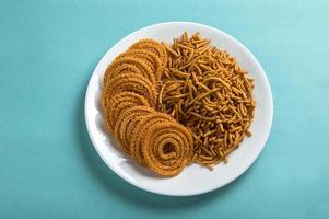 Indian Snack Besan Gram flour Sev and chakli, chakali or Murukku. photo