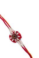 Indian festival Raksha Bandhan background with an elegant Rakhi on a white background photo