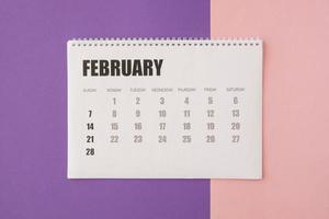 top view desk february calendar photo