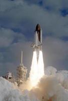 The STS-31 crew launched aboard the Space Shuttle Discovery photo