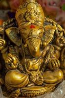 Statue of Hindu God Ganesha. close up of Ganesha Idol at an artist's workshop during Ganesha Festival. photo