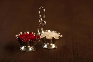 Kumkum and rice grain container. Natural color powders are used while worshipping God and an at auspicious occasions. photo