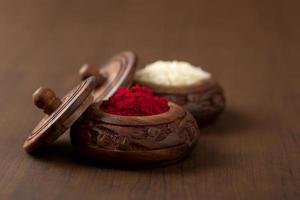 Kumkum and rice grain container. Natural color powders are used while worshipping God and an at auspicious occasions. photo