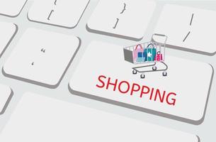 Shopping cart on a laptop keyboard. vector