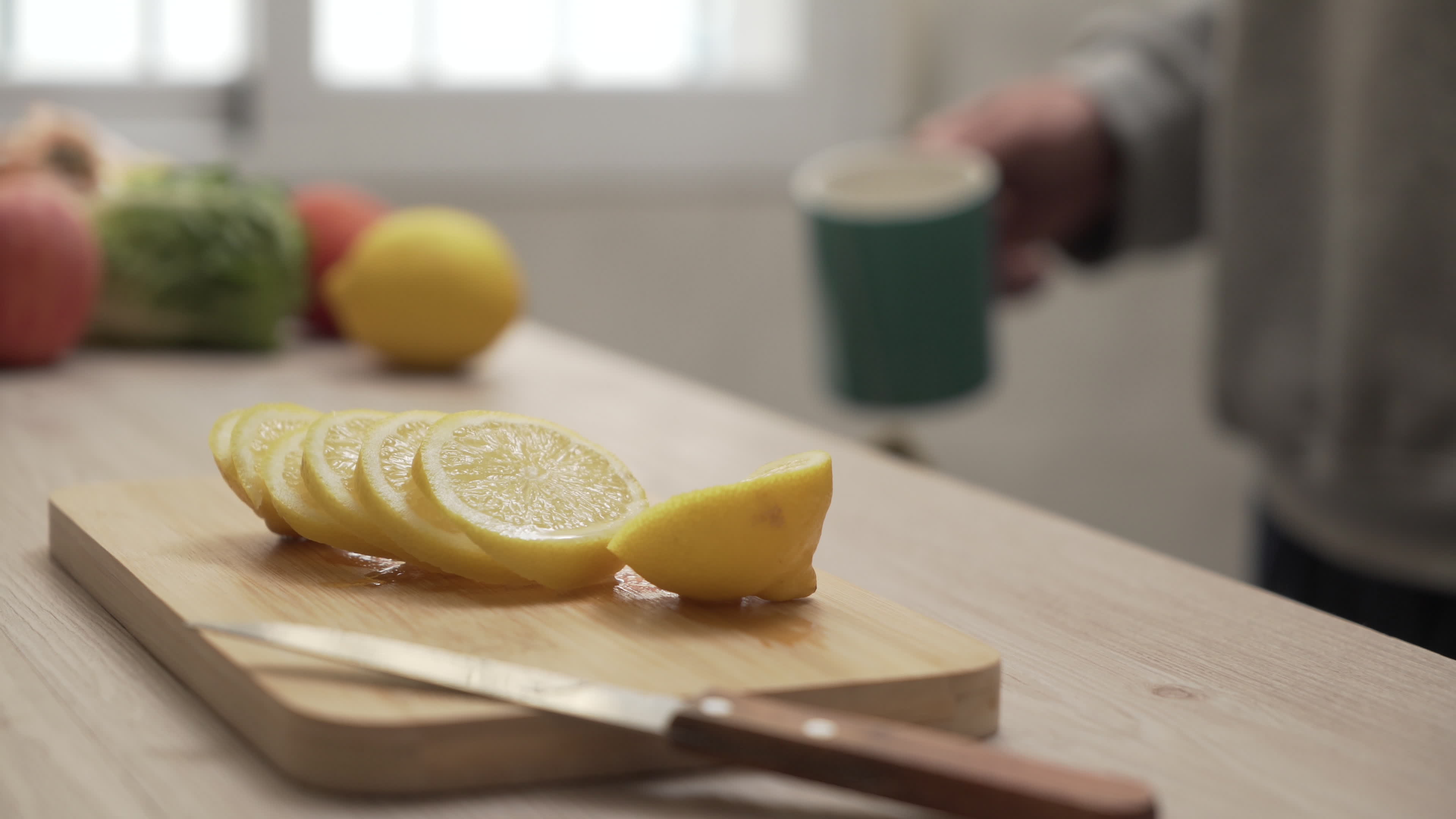 Adding Lemon To Tea