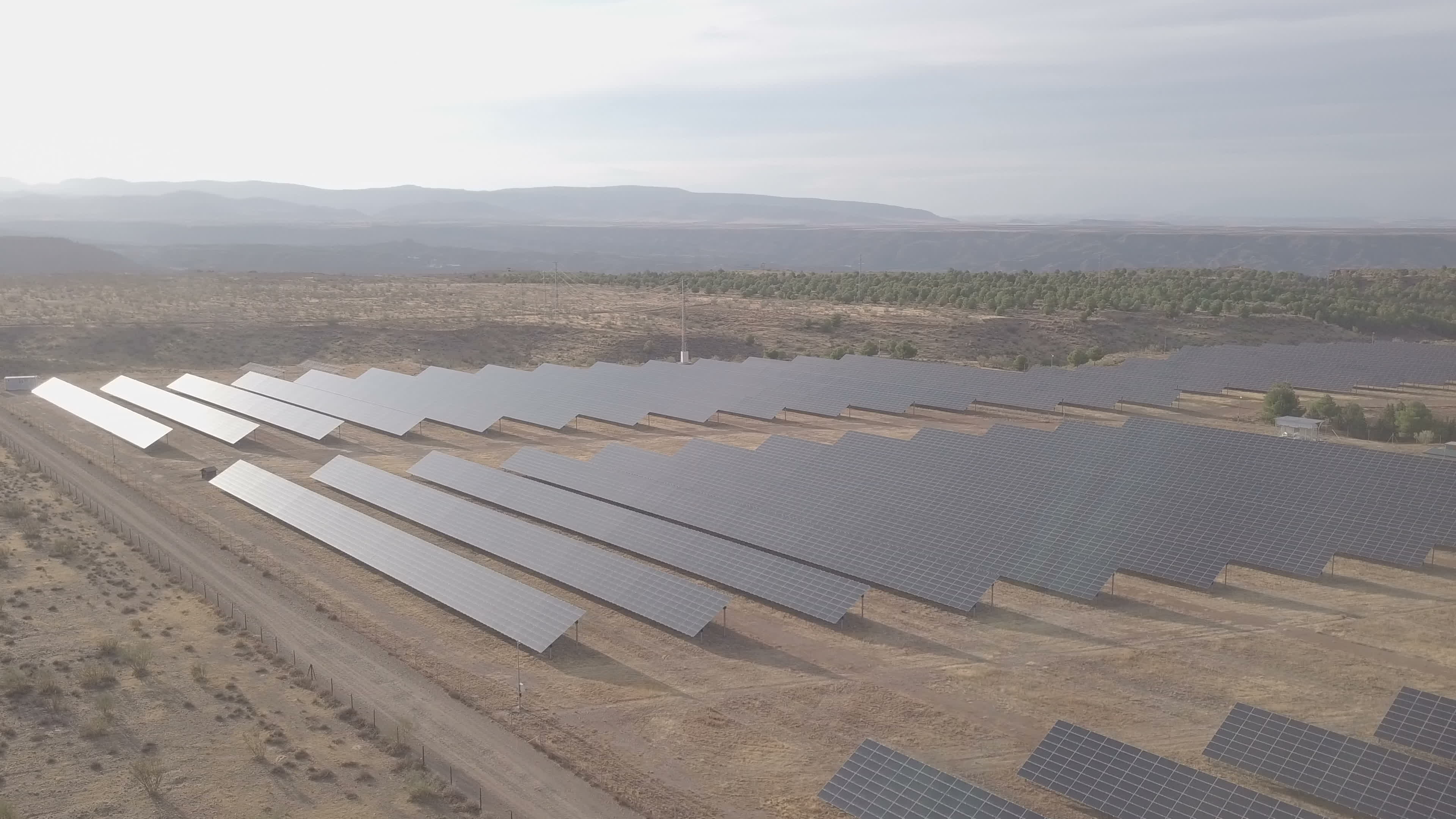 4k Aerial View. Flying Over The Solar Power Plant With Sun 4988027