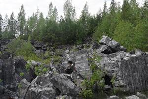 deposits of natural marble in the forest photo