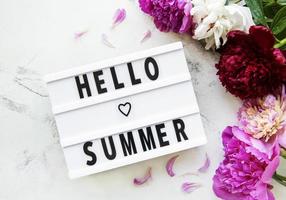 Light box with Hello Summer text and peonies photo