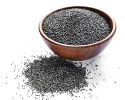 Poppy seeds in small wooden bowl