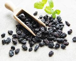 Black dried raisins photo