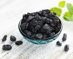 Black dried raisins photo