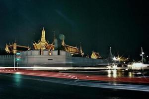 Wat Phra Kaew at night and street bangkok Thailand. photo