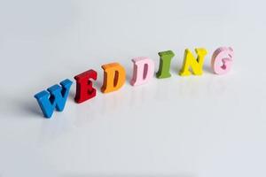 The word wedding on a white background. photo