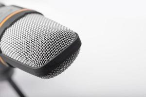 Microphone closeup on white background. photo