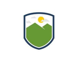 Shield with green mountain inside vector