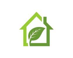 Simple house with green nature leaf inside vector