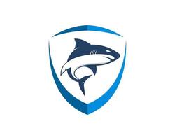 Abstract shield with jumping shark inside vector