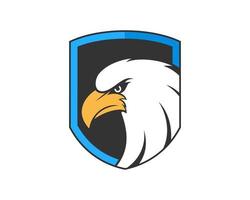 Shield with luxury eagle inside vector