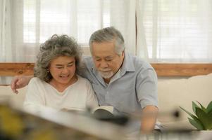 Senior couples who live happily together pay attention to each other without having children and grandchildren to look after. photo