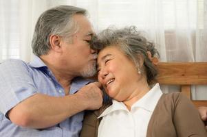 Senior couples who live happily together pay attention to each other without having children and grandchildren to look after. photo