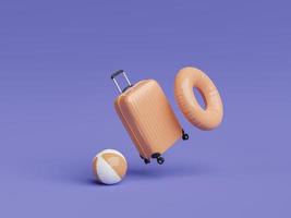 suitcase with beach ball and swimming float photo