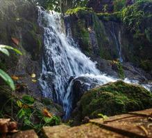 beautiful waterfall photo in borneo forest