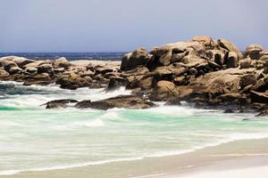 Camps Bay Beach turquoise water rocks, Cape Town, South Africa. photo